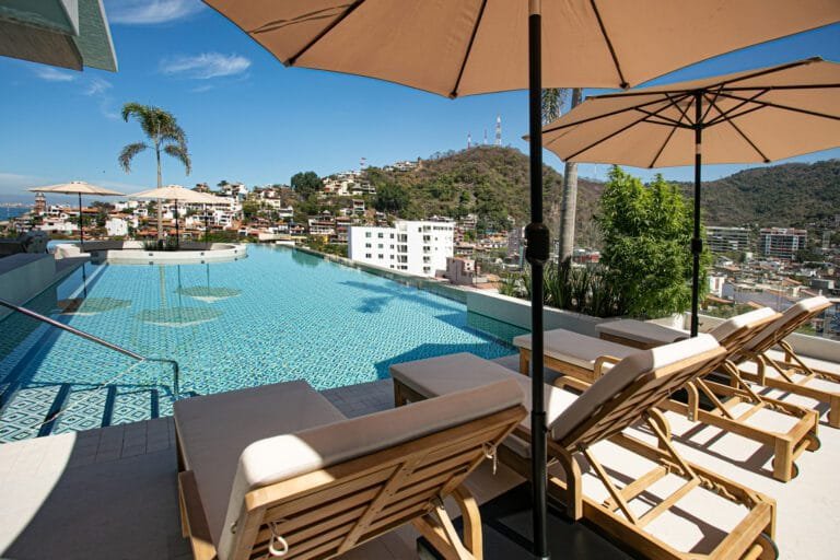 Rooftop dining area with umbrellas